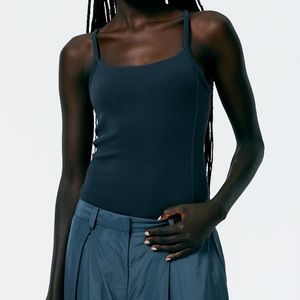 TIBI RIBBED T SHIRT BODY SUIT, SIZE SMALL.